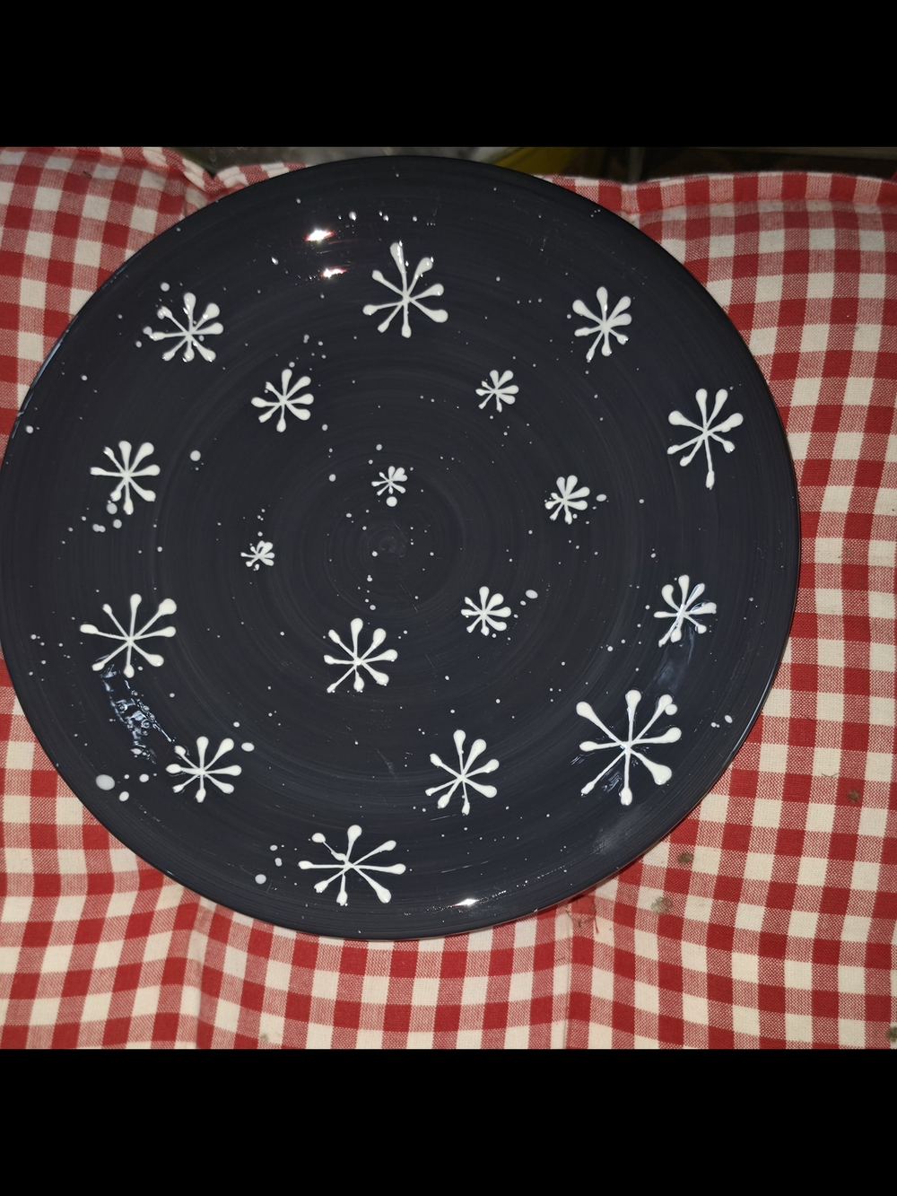 Certified International Dark Blue Ceramic Plate with White Snowflake Motif
